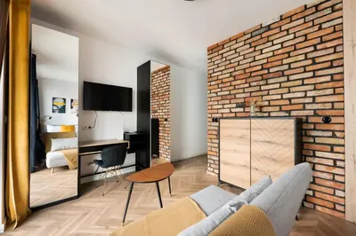 Telewizja i/lub zestaw kina domowego w obiekcie Woronicza 80 Modern Studio by BookingHost