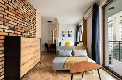 Część wypoczynkowa w obiekcie Woronicza 80 Modern Studio by BookingHost