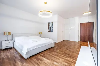 Łóżko lub łóżka w pokoju w obiekcie Luxury Princessa Apartment & garage & cable tv channels