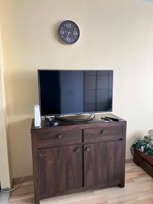 Telewizja i/lub zestaw kina domowego w obiekcie Przytulna kawalerka Muranów przy POLIN WiFi Netflix