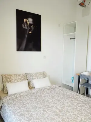 Łóżko lub łóżka w pokoju w obiekcie OstWestApart A32