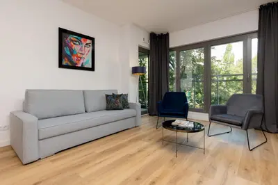 Część wypoczynkowa w obiekcie Apartment Avenue Solidarnosci on Wola by Noclegi Renters
