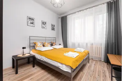 Łóżko lub łóżka w pokoju w obiekcie Siewierska 17 by Homeprime