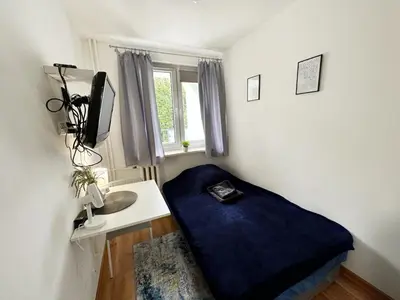 Łóżko lub łóżka w pokoju w obiekcie Anielewicza 26 Rooms