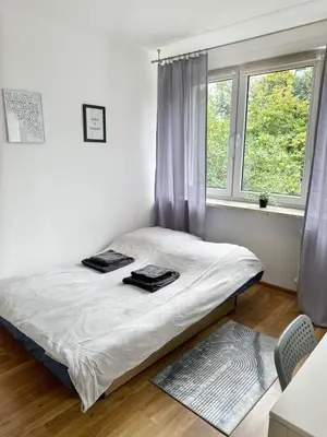 Łóżko lub łóżka w pokoju w obiekcie Anielewicza 26 Rooms