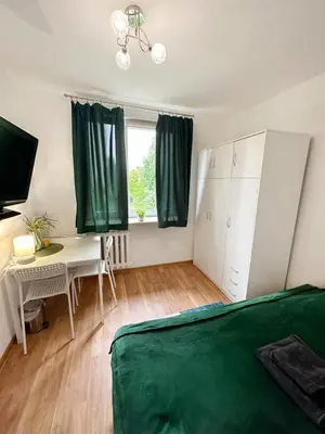 Łóżko lub łóżka w pokoju w obiekcie Anielewicza 26 Rooms