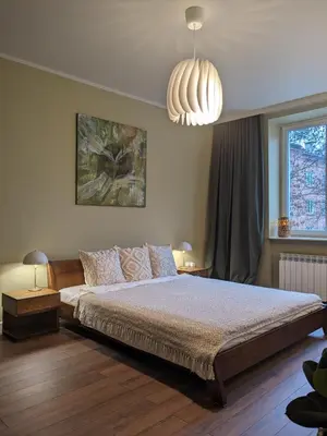 Łóżko lub łóżka w pokoju w obiekcie Warsaw Studio Wola
