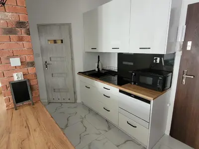 Kuchnia lub aneks kuchenny w obiekcie Juliana Smulikowskiego 2