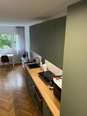 Kuchnia lub aneks kuchenny w obiekcie Przytulna kawalerka typu studio