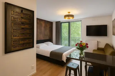 Łóżko lub łóżka w pokoju w obiekcie BROWARY DESIGNER APARTMENTS by Country 2 Country