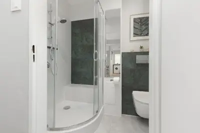 Łazienka w obiekcie Cozy Two-Bedroom Apartment Mokotow by Noclegi Renters