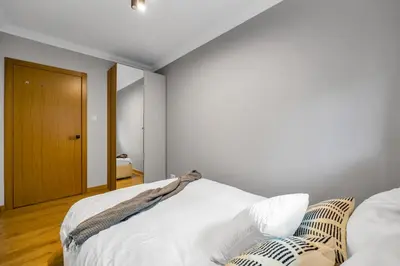 Łóżko lub łóżka w pokoju w obiekcie VipWarsawApartments pl Gold Mennica Residence