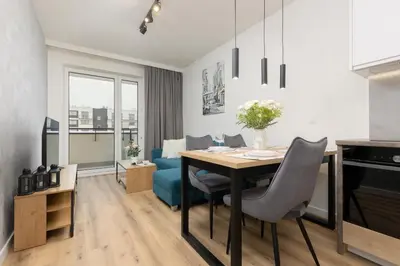 Część wypoczynkowa w obiekcie Łopuszańska Apartment with Balcony in Warsaw by Noclegi Renters