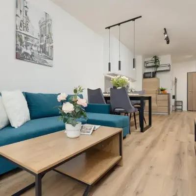 Łopuszańska Apartment with Balcony in Warsaw by Noclegi Renters