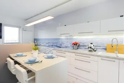 Kuchnia lub aneks kuchenny w obiekcie Wagonowa Premium Studio Chopin Airport