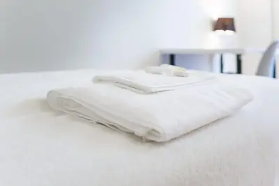 Łóżko lub łóżka w pokoju w obiekcie Apartament Puławska 105