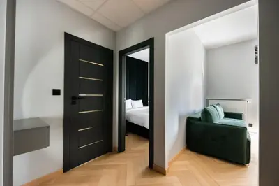 Łóżko lub łóżka w pokoju w obiekcie Varsovia Comfort 204 by BookingHost