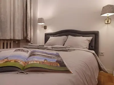 Łóżko lub łóżka w pokoju w obiekcie Luxury Living Kopernik
