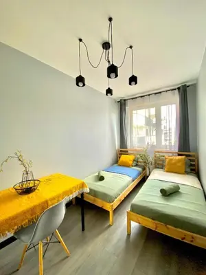 Łóżko lub łóżka w pokoju w obiekcie Centre Airport Boutique Designer Bath, 3-4 days best offer, Kitchen, Balkony, Aircon