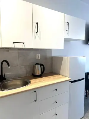 Kuchnia lub aneks kuchenny w obiekcie Apartment Solidarności, Metro, Wi-Fi, TV, YouTube - by HIK Apartments