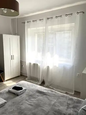 Łóżko lub łóżka w pokoju w obiekcie Apartment Solidarności, Metro, Wi-Fi, TV, YouTube - by HIK Apartments