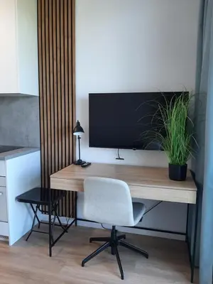 Telewizja i/lub zestaw kina domowego w obiekcie Cubus Nest Apartment