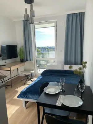 Telewizja i/lub zestaw kina domowego w obiekcie Cubus Nest Apartment