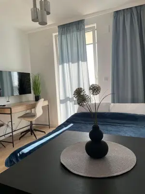 Telewizja i/lub zestaw kina domowego w obiekcie Cubus Nest Apartment