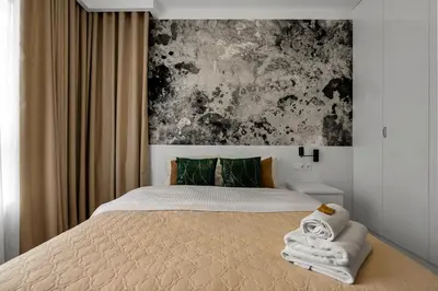Łóżko lub łóżka w pokoju w obiekcie Lotnisko Chopina Modern Apartment by BookingHost