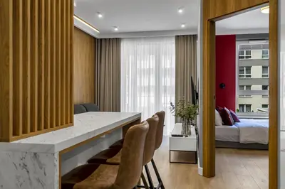 Łóżko lub łóżka w pokoju w obiekcie Lotnisko Chopina Modern Apartment by BookingHost