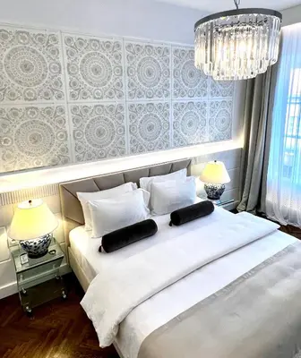 Łóżko lub łóżka w pokoju w obiekcie MONDRIAN Luxury Apartments Old Town