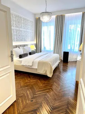 Łóżko lub łóżka w pokoju w obiekcie MONDRIAN Luxury Apartments Old Town