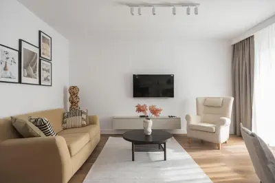 Część wypoczynkowa w obiekcie Metro Kabaty Elegant Apartment by BookingHost