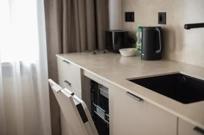 Kuchnia lub aneks kuchenny w obiekcie Metro Kabaty Elegant Apartment by BookingHost