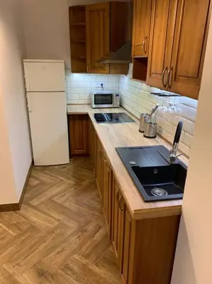 Kuchnia lub aneks kuchenny w obiekcie Close Wola Studio
