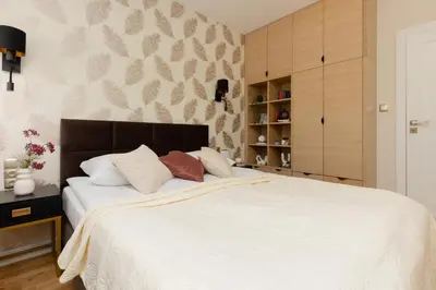 Łóżko lub łóżka w pokoju w obiekcie Deluxe Apartment Wronia 45 with AC, Parking & Balcony by Renters Prestige