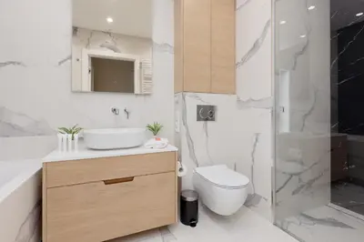 Łazienka w obiekcie Deluxe Apartment Wronia 45 with AC, Parking & Balcony by Renters Prestige