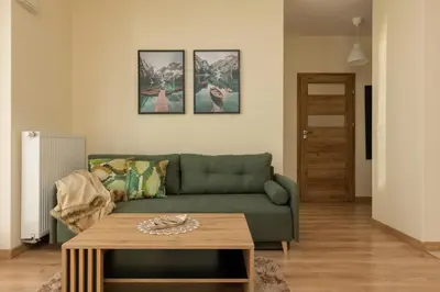 Część wypoczynkowa w obiekcie Cosy Apartment Białej Floty with Parking by Noclegi Renters