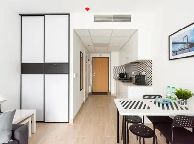 Kuchnia lub aneks kuchenny w obiekcie Praga Bliska Comfort Studio by BookingHost