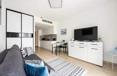 Telewizja i/lub zestaw kina domowego w obiekcie Praga Bliska Comfort Studio by BookingHost