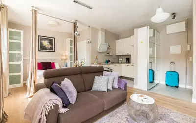Kuchnia lub aneks kuchenny w obiekcie Cosy Studio Nowy Świat Śródmieście by Noclegi Renters