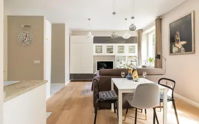 Telewizja i/lub zestaw kina domowego w obiekcie Cosy Studio Nowy Świat Śródmieście by Noclegi Renters