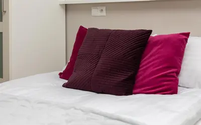 Łóżko lub łóżka w pokoju w obiekcie Cosy Studio Nowy Świat Śródmieście by Noclegi Renters