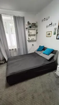 Łóżko lub łóżka w pokoju w obiekcie Apartament Żoliborz