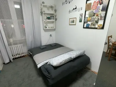 Łóżko lub łóżka w pokoju w obiekcie Apartament Żoliborz