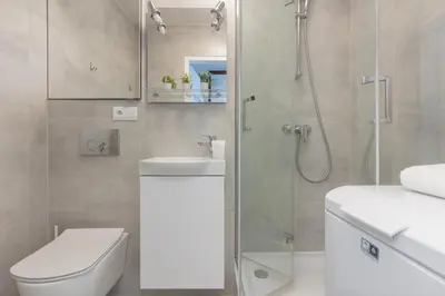 Łazienka w obiekcie Heart of Warsaw Apartment Zielna by Noclegi Renters