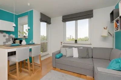 Część wypoczynkowa w obiekcie Metro Wilanowska Apartment with Parking by Noclegi Renters