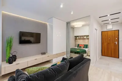 Telewizja i/lub zestaw kina domowego w obiekcie VipWarsawApartments pl Sienna 65
