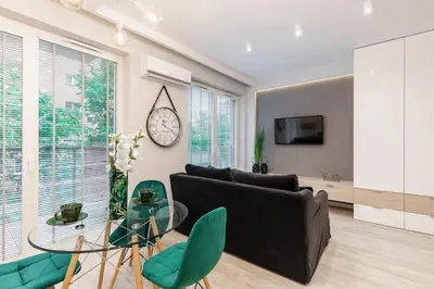 Telewizja i/lub zestaw kina domowego w obiekcie VipWarsawApartments pl Sienna 65