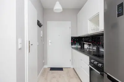 Kuchnia lub aneks kuchenny w obiekcie Praga Jagiellońska Comfort Studio by BookingHost